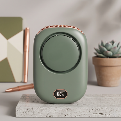 Close-up of the RetailArk sage green neck fan on a stone pedestal with desk accessories.