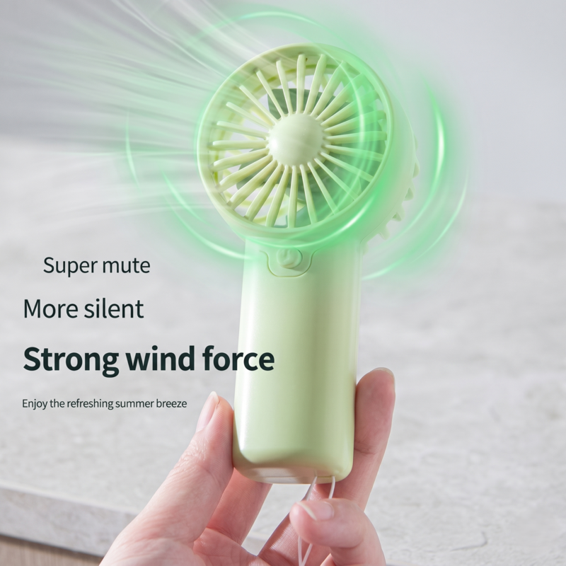 Handheld Retailark mini fan in mint green showing strong wind force and silent motor feature.